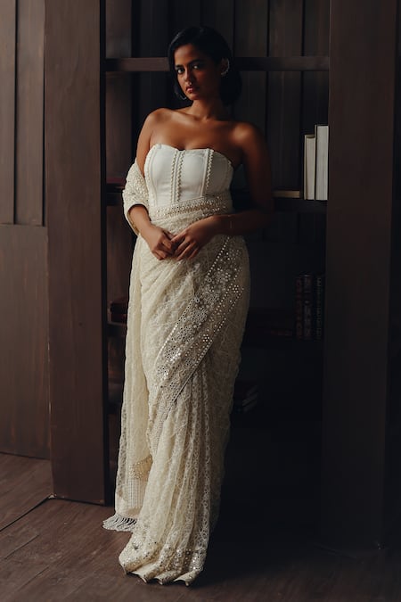Twenty Nine_Ivory Net, Satin Beads, Mirrors, Tassels Beadwork Jaal Saree With Corset Blouse _at_Aza_Fashions