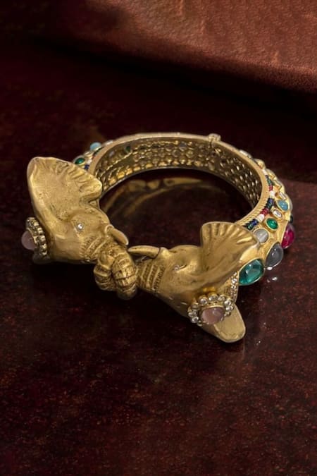 Shop Amaara Jewels Gold Plated Stones, Beads Hasti Ratna Matte Navratan Polki Elephant Bangle at Aza Fashions Shop_Amaara Jewels_Gold Plated Stones, Beads Hasti Ratna Matte Navratan Polki Elephant Bangle _at_Aza_Fashions