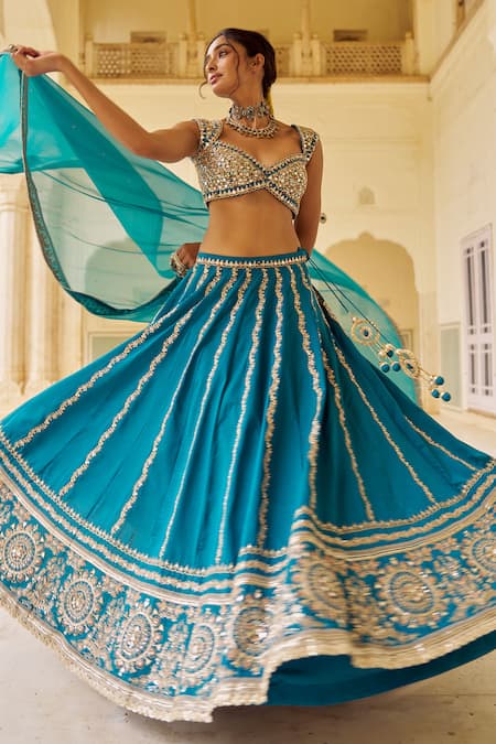 Lashkaraa_Teal Silk, Net Embroidery, Sequins, Mirrors, Zari Sweetheart Neck Lehenga Set_at_Aza_Fashions