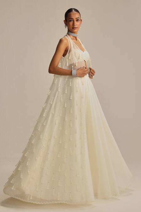 Vvani By Vani Vats Off White Georgette, Organza Mirrors, Pearls, Tassels, And Work Jacket Skirt Set at Aza Fashions Vvani By Vani Vats_Off White Georgette, Organza Mirrors, Pearls, Tassels, And Work Jacket Skirt Set _at_Aza_Fashions