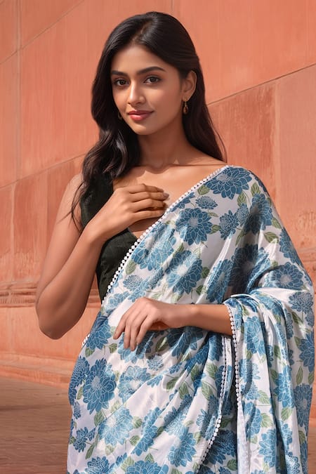 Shop_Naintara Bajaj_Sky Blue Chinon Pom-poms V-neck Floral Print Pre-draped Saree With Blouse _Online_at_Aza_Fashions