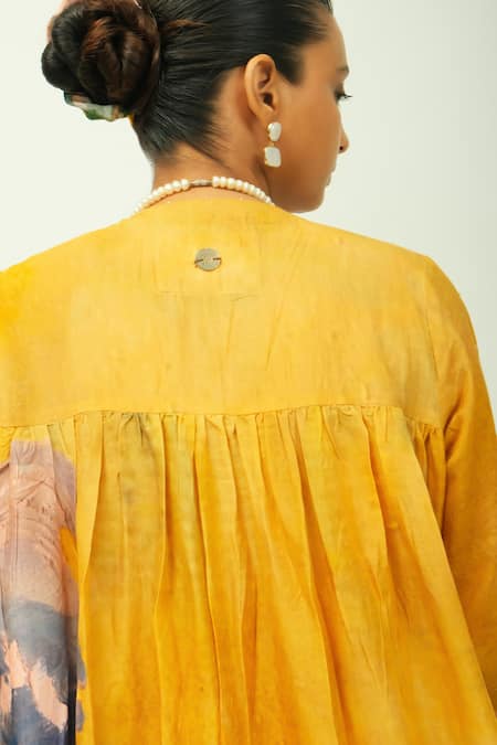 OFRIDA_Mustard V-neck Sol Dotted Dobby Abstract Print Dress _at_Aza_Fashions