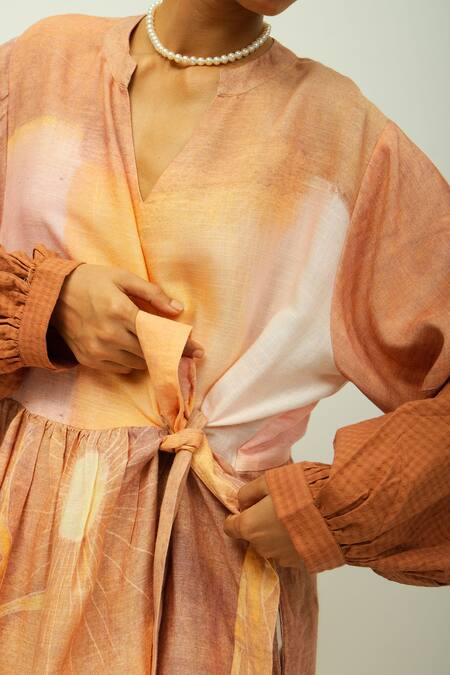 Shop_OFRIDA_Peach Viscose V-neck Daydream Printed Wrap Dress  _Online_at_Aza_Fashions