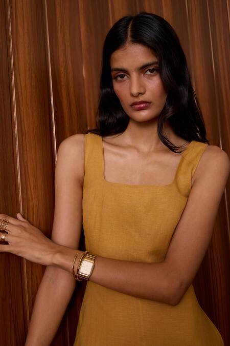 The Summer House_Mustard Linen Smocking Square Neck Glasswing Dress _at_Aza_Fashions