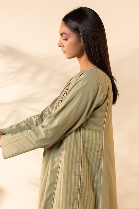 OurDve Green Cotton Embroidery, Sequins, Tassels Split V-neck Sunpetal Gathered Dress at Aza Fashions OurDve_Green Cotton Embroidery, Sequins, Tassels Split V-neck Sunpetal Gathered Dress _at_Aza_Fashions