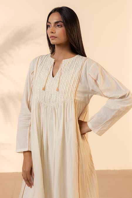 Buy Ourdve Beige Cotton Embroidery, Tassels Split V-neck Sunpetal Gathered Dress Buy_Ourdve_Beige Cotton Embroidery, Tassels Split V-neck Sunpetal Gathered Dress