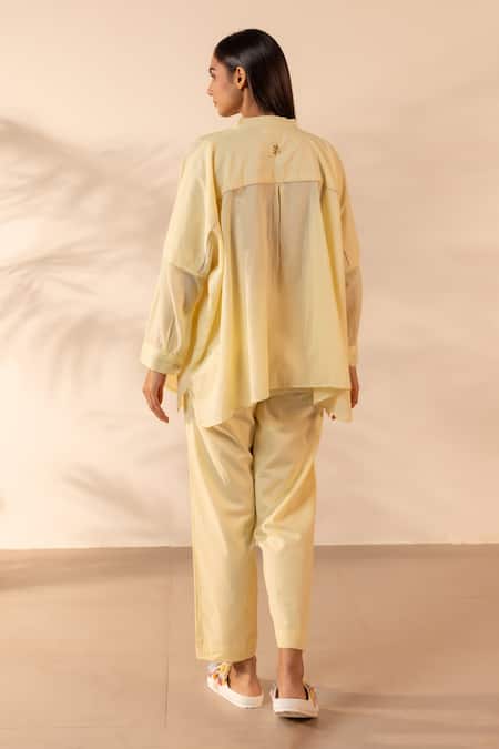 Shop OurDve Yellow Cotton Embroidery Mandarin Collar Drizzle Pintuck And Floral Top With Pant at Aza Fashions Shop_OurDve_Yellow Cotton Embroidery Mandarin Collar Drizzle Pintuck And Floral Top With Pant _at_Aza_Fashions