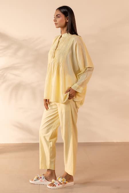 Shop OurDve Yellow Cotton Embroidery Mandarin Collar Drizzle Pintuck And Floral Top With Pant Online at Aza Fashions Shop_OurDve_Yellow Cotton Embroidery Mandarin Collar Drizzle Pintuck And Floral Top With Pant _Online_at_Aza_Fashions