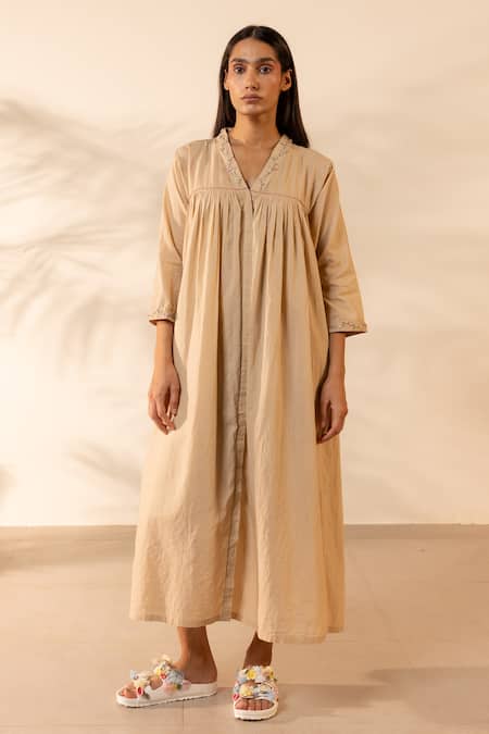 Ourdve Beige Cotton Embroidery V-neck Gathered Dress at Aza Fashions Ourdve_Beige Cotton Embroidery V-neck Gathered Dress _at_Aza_Fashions