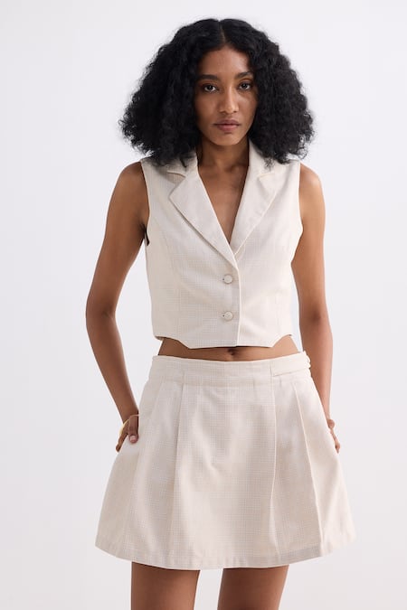Reistor_Cream Cotton Notched Neck Tweed Cropped Vest And Pleated Skorts Set _at_Aza_Fashions