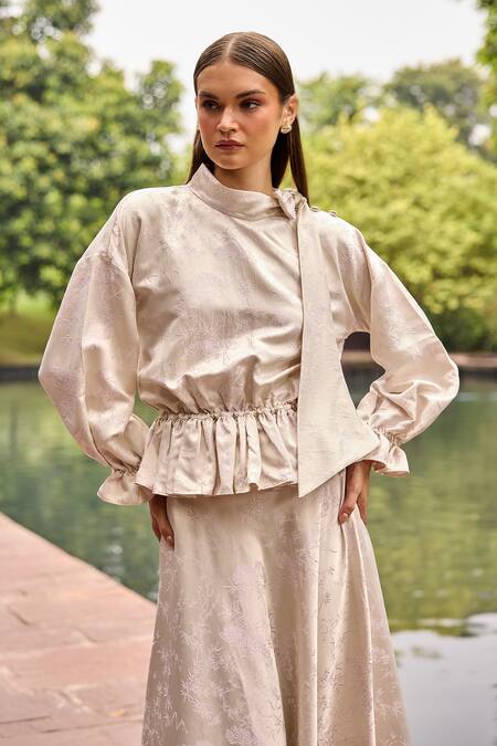 Buy Therealb Ivory Jacquard High Neck Peplum Top And Asymmetric Skirt Set Online at Aza Fashions Buy_Therealb_Ivory Jacquard High Neck Peplum Top And Asymmetric Skirt Set _Online_at_Aza_Fashions