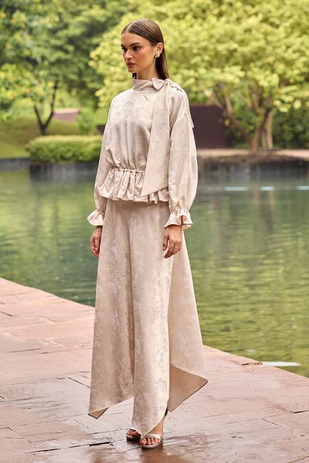 Shop Therealb Ivory Jacquard High Neck Peplum Top And Asymmetric Skirt Set Online at Aza Fashions Shop_Therealb_Ivory Jacquard High Neck Peplum Top And Asymmetric Skirt Set _Online_at_Aza_Fashions