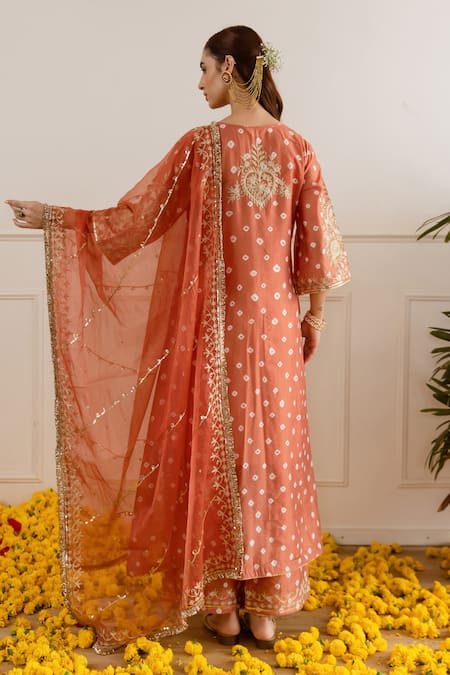 Shop ASRUMO Rust Chanderi, Organza Embroidery, Zari V-neck Bandhej Taari Kurta Set at Aza Fashions Shop_ASRUMO_Rust Chanderi, Organza Embroidery, Zari V-neck Bandhej Taari Kurta Set _at_Aza_Fashions