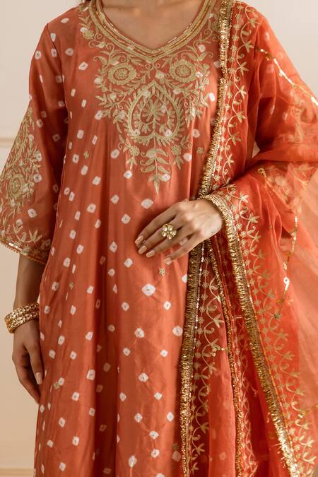 Buy ASRUMO Rust Chanderi, Organza Embroidery, Zari V-neck Bandhej Taari Kurta Set Buy_ASRUMO_Rust Chanderi, Organza Embroidery, Zari V-neck Bandhej Taari Kurta Set