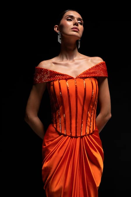 Vesture Orange Satin Sequins, Beads Off-shoulder Tangelo Corset And Draped Skirt Set Online at Aza Fashions Vesture_Orange Satin Sequins, Beads Off-shoulder Tangelo Corset And Draped Skirt Set _Online_at_Aza_Fashions