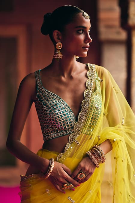 Angad Singh_Yellow Net Mirrors, Zari V-neck Saree With Blouse _at_Aza_Fashions