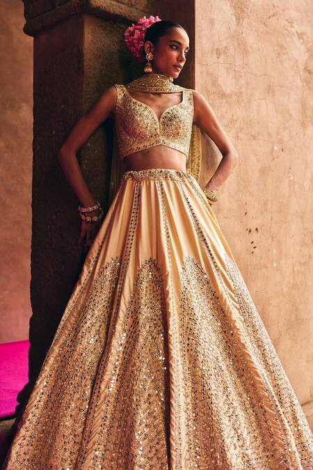 Angad Singh_Gold Silk Mirrors, Zari, Gota Patti Champagne Raw Bridal Lehenga Set _at_Aza_Fashions