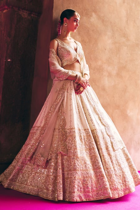 Shop Angad Singh Ivory Silk, Net Mirrors, Zari, Gota Patti, Embroidery Raw Bridal Lehenga Set Online at Aza Fashions Shop_Angad Singh_Ivory Silk, Net Mirrors, Zari, Gota Patti, Embroidery Raw Bridal Lehenga Set _Online_at_Aza_Fashions