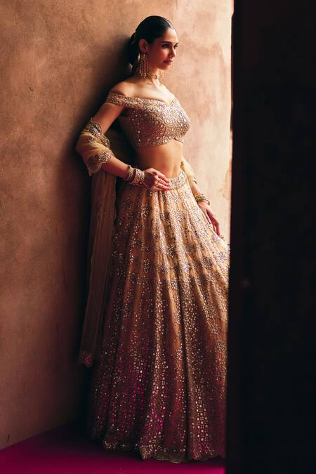 Shop_Angad Singh_Gold Organza Mirrors, Embroidery, Tassels Off-shoulder Bridal Lehenga Set _Online_at_Aza_Fashions