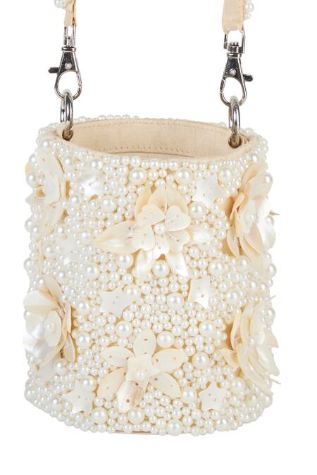 Shop_The Purple Sack_Off White Beads, Sequins, Fabric Flowers Pearl And Embellished Floral Potli Bag _Online_at_Aza_Fashions