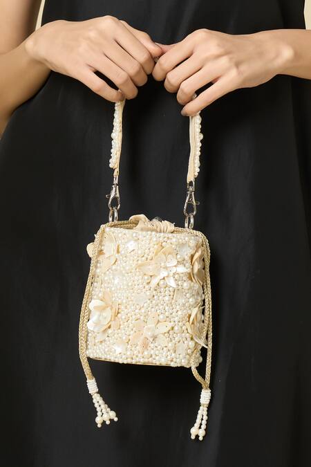 The Purple Sack_Off White Beads, Sequins, Fabric Flowers Pearl And Embellished Floral Potli Bag _at_Aza_Fashions