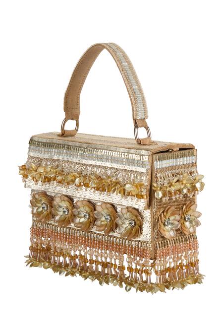 Shop_The Purple Sack_Gold Beads, Embroidery, Sequins, Tassels Floral And Embellished Raw Silk Bag _Online_at_Aza_Fashions