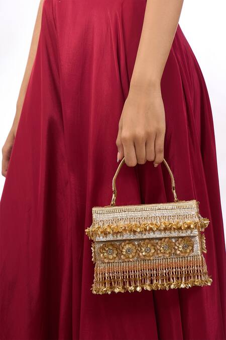 The Purple Sack_Gold Beads, Embroidery, Sequins, Tassels Floral And Embellished Raw Silk Bag _at_Aza_Fashions
