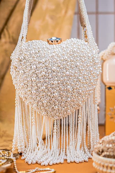 NR By Nidhi Rathi Pearl Embellished Heart Shape Clutch with Tassels 