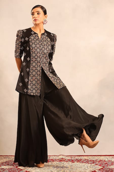 Sejal Kamdar_Black Patchwork Split V-neck Ajrakh Peplum Jacket And Flared Pant _at_Aza_Fashions