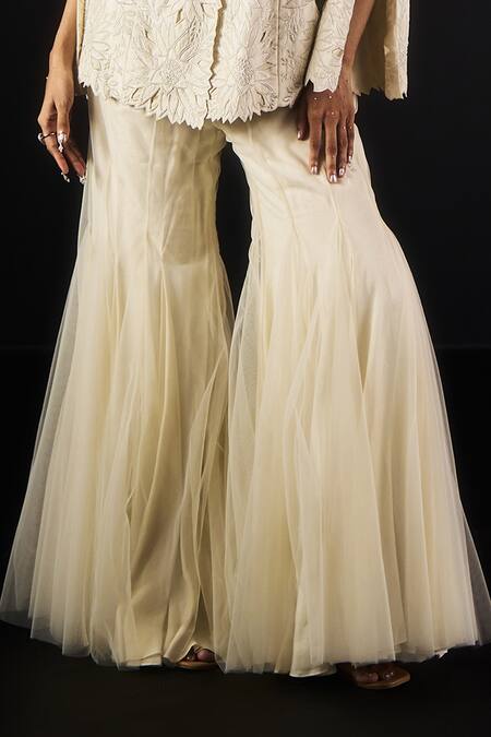 Aanchal Vijaywargi_Ivory Chanderi, Net Embroidery, Cut Work Pearl Glow Peplum Blazer With Palazzo _Online_at_Aza_Fashions