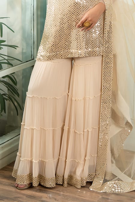 Akanksha Mago_Beige Georgette, Net Sequins, Embroidery V-neck Kurta And Gharara Set _Online_at_Aza_Fashions