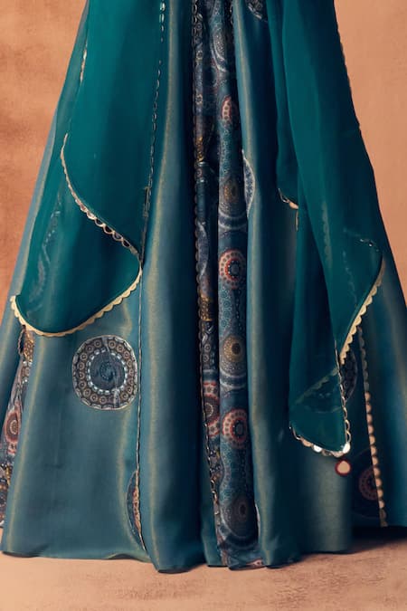 Label Moni K_Teal Tissue, Crepe, Organza Embroidery, Zari, Chakra Scallop Lehenga Set _Online_at_Aza_Fashions