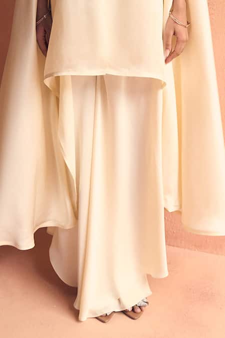 Label Moni K Ivory Satin Embroidery, Beads V-neck Sway Kaftan With Pant Online at Aza Fashions Label Moni K_Ivory Satin Embroidery, Beads V-neck Sway Kaftan With Pant _Online_at_Aza_Fashions