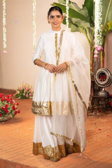 Buy Panchhi By Kanupriya Tibrewala Off White Chanderi Embroidery, Zari, Gota Patti Samriddhi Tunic Palazzo Set Online at Aza Fashions Buy_Panchhi By Kanupriya Tibrewala_Off White Chanderi Embroidery, Zari, Gota Patti Samriddhi Tunic Palazzo Set _Online_at_Aza_Fashions