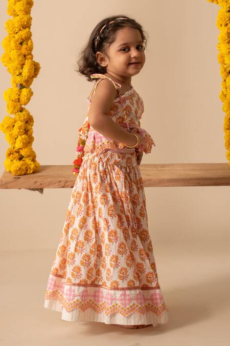 Plumcheeks White Cotton Embroidery, Tassels Pihu One Shoulder Top And Lehenga Set Online at Aza Fashions Plumcheeks_White Cotton Embroidery, Tassels Pihu One Shoulder Top And Lehenga Set _Online_at_Aza_Fashions