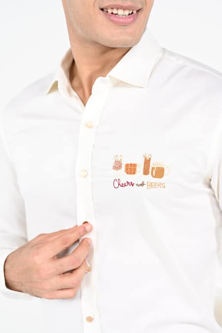 Kalpana Naik_Cream Cotton Embroidery Cheers And Hand Shirt _at_Aza_Fashions