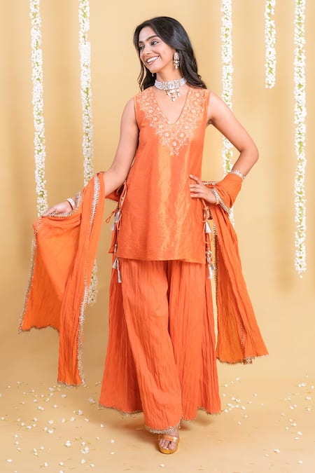 Shop_Grass & Sunshine_Rust Viscose Embroidery, Tassels, Lace V-neck Radiance Crinkled Sharara Set _Online_at_Aza_Fashions