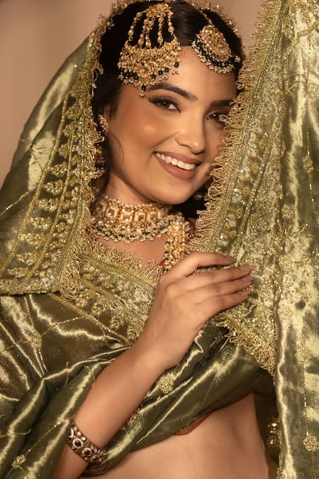 Amaltas Couture_Orange Tissue Embroidery, Sequins, Stones, Zari V-neck Rust Bridal Lehenga Set _at_Aza_Fashions