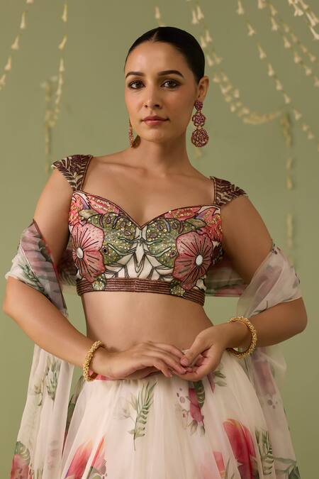 Meesa_White Organza Embroidery, Sequins, Tassels Sweetheart Neck Printed Lehenga Set _Online_at_Aza_Fashions