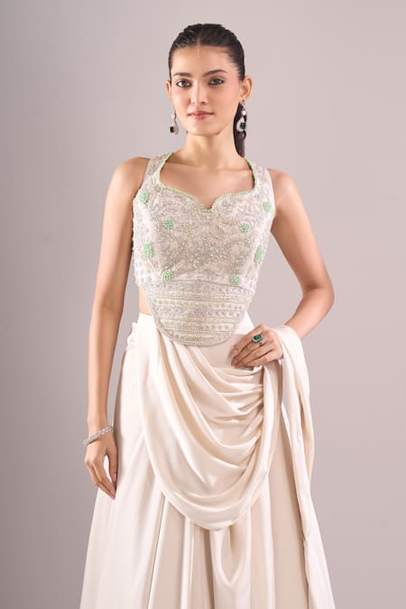 Samyukta Singhania_Off White Satin Embroidery, Beads, Sequins Hand Blouse And Draped Lehenga Set _at_Aza_Fashions