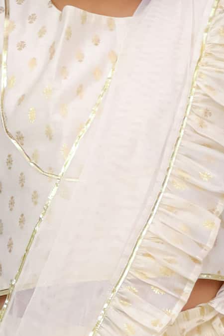 Lil Drama Off White Chanderi Foil Printing, Ruffles Mishti Printed Lehenga Set Online at Aza Fashions Lil Drama_Off White Chanderi Foil Printing, Ruffles Mishti Printed Lehenga Set _Online_at_Aza_Fashions