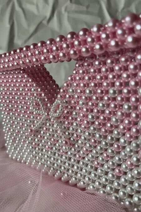 Rubilon_White Pearls, Bows Izzy Gradient Handwoven Clutch _Online_at_Aza_Fashions