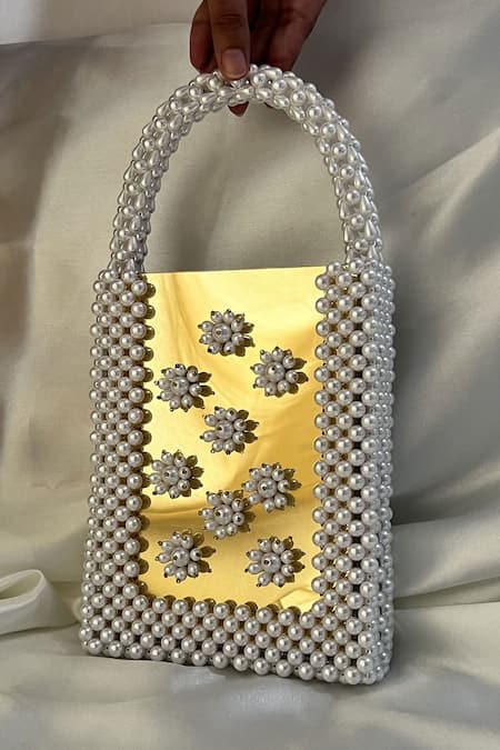 Rubilon Pearl & Golden Frame Floral Handwoven Clutch 