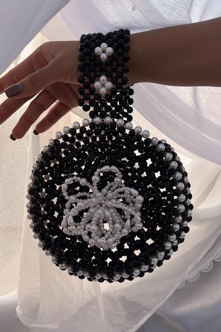 Rubilon_Black Beads, Pearls Bloom Beaded Circular Wristlet With Flower _Online_at_Aza_Fashions