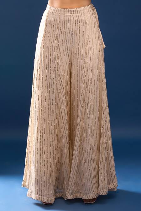 Buy Azeera Ivory Net Embroidery, Sequins, Beads, Zari Leaf Neck Kurta Sharara Set Online at Aza Fashions Buy_Azeera_Ivory Net Embroidery, Sequins, Beads, Zari Leaf Neck Kurta Sharara Set _Online_at_Aza_Fashions