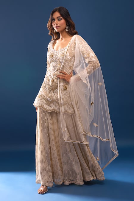 Shop Azeera Ivory Net Embroidery, Sequins, Beads, Zari Leaf Neck Kurta Sharara Set Online at Aza Fashions Shop_Azeera_Ivory Net Embroidery, Sequins, Beads, Zari Leaf Neck Kurta Sharara Set _Online_at_Aza_Fashions
