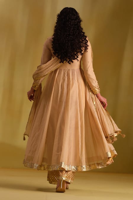 Shop Almaari By Pooja Patel Beige Silk, Chanderi Gota Patti, Tassels Square Arya Embroidered Anarkali Set at Aza Fashions Shop_Almaari By Pooja Patel_Beige Silk, Chanderi Gota Patti, Tassels Square Arya Embroidered Anarkali Set _at_Aza_Fashions