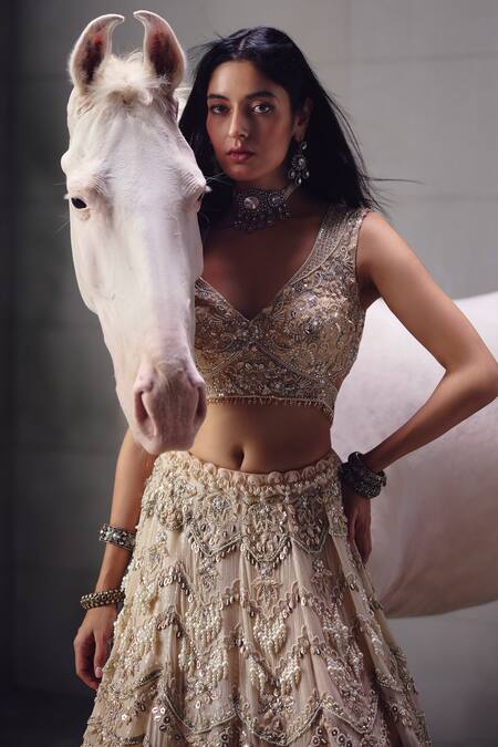 Shop_Awigna_Ivory Net Embroidery, Beads, Sequins V-neck Bridal Lehenga Set _Online_at_Aza_Fashions