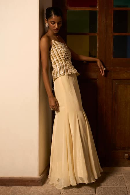 Buy_Saangi_Ivory Crepe, Viscose Sequins, Zari, Embroidery Ember Sculpted Corset With Skirt _Online_at_Aza_Fashions