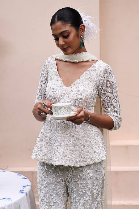 Buy_Meenagurnam_Ivory Net Sequins, Beads, Cut Work V-neck Embellished Peplum Kurta Sharara Set _Online_at_Aza_Fashions